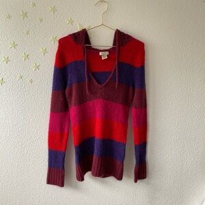 Soft and cozy red and purple multi striped sweater with a hoodie